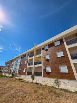 Exterior of a modern residential building with balconies and a decorated facade. - image 8