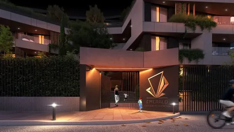 Eksterijer moderne stambene zgrade sa osvijetljenim ulazom i uređenim dvorištem. - image 9