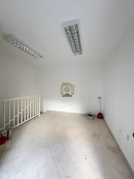 Empty bright room with white walls and tiled flooring. - image 3