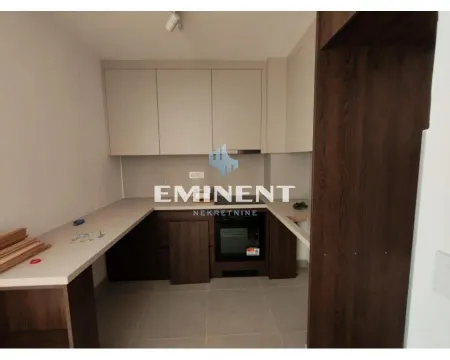 Modern kitchen with built-in units and appliances. - image 4