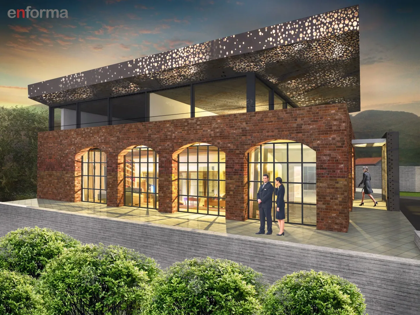 Exterior view of a modern commercial building with brickwork on the ground floor.