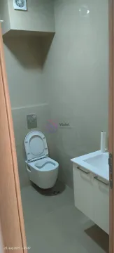Smaller bathroom with a wall-hung toilet and a vanity unit. - image 7