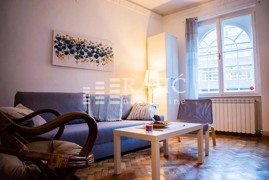 Living room with a sofa and coffee table.
