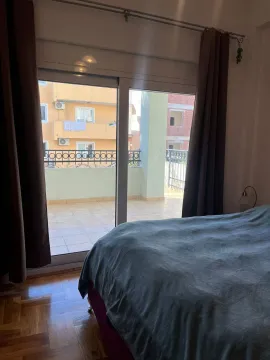 Bedroom with a double bed and access to the terrace. - image 6