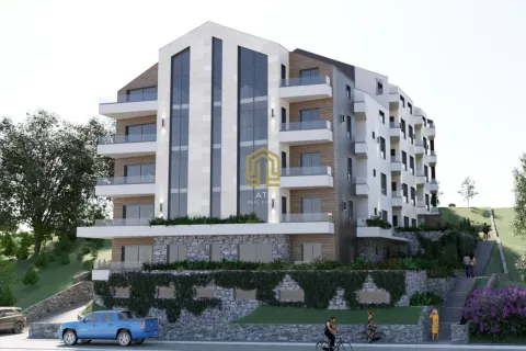 Spoljašnji prikaz moderne stambene zgrade sa uređenom okolinom. - image 6
