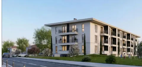 Spoljašnji izgled moderne stambene zgrade sa uređenim dvorištem. - image 2