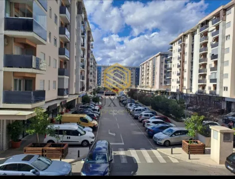 View from the terrace of residential buildings and parking in front of the complex. - image 2