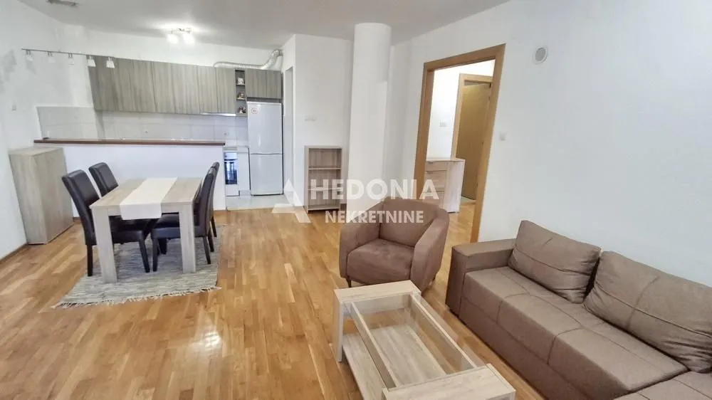 Living room with dining area and kitchen in the extension.