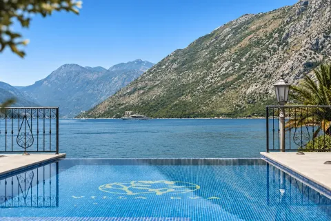 View from the pool towards the sea and mountains. - image 10