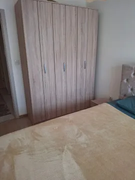 Bedroom with a wardrobe and a double bed. - image 4