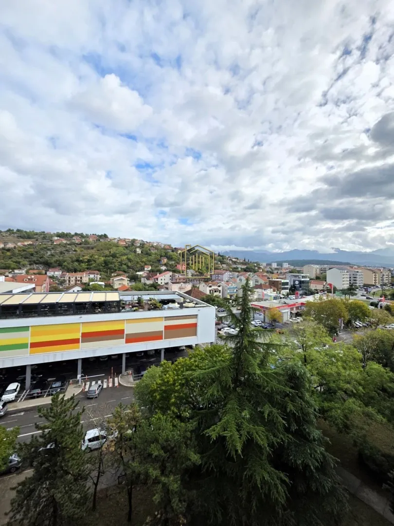 View from the property of the city settlement and surrounding greenery.