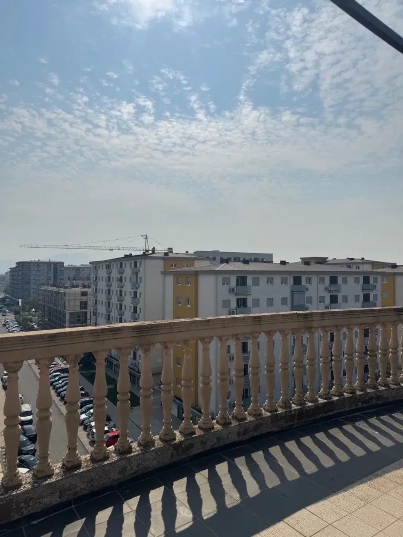 View from the balcony overlooking the urban neighborhood.