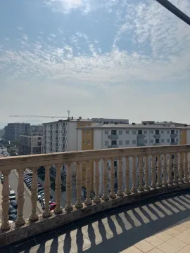 View from the balcony overlooking the urban neighborhood. - image 6