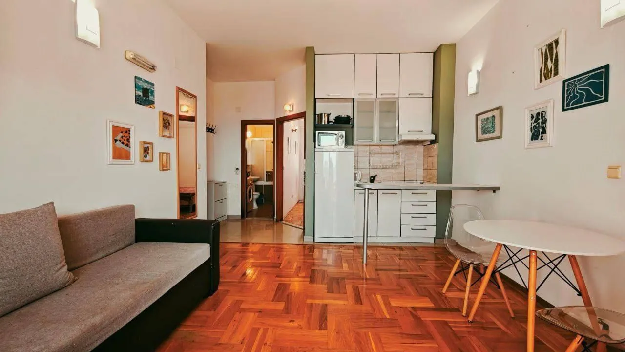 Living room combined with dining area and kitchen.