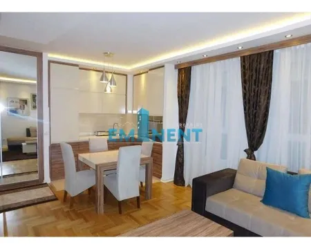 Living room with a dining area and kitchen in the extension. - image 10