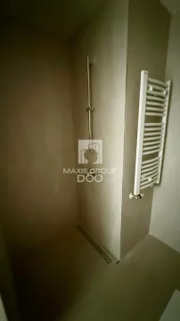 Modernly equipped bathroom with a walk-in shower. - image 9