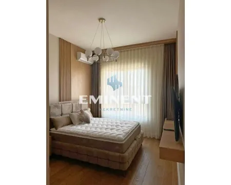 Modern bedroom with a double bed, wooden wall panels, and a large window. - image 9