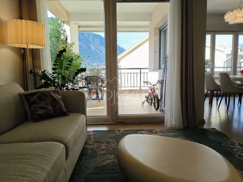 Living room with a sofa and access to the terrace. - image 7