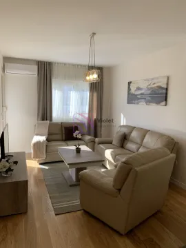 Comfortable living room with a sofa set and a TV unit. - image 5