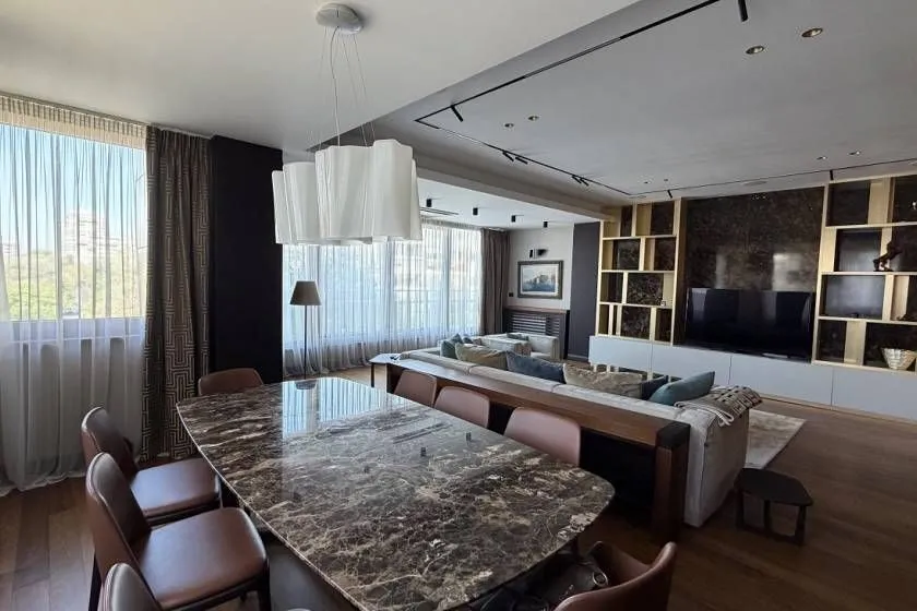 Spacious living room with a dining area and modern furniture.
