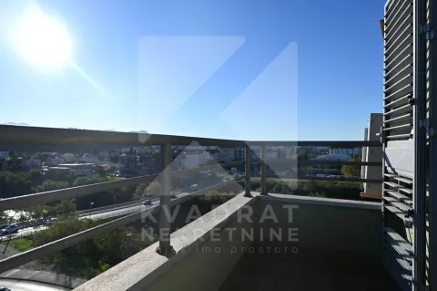View from the balcony overlooking the surrounding neighborhood and city. - image 15