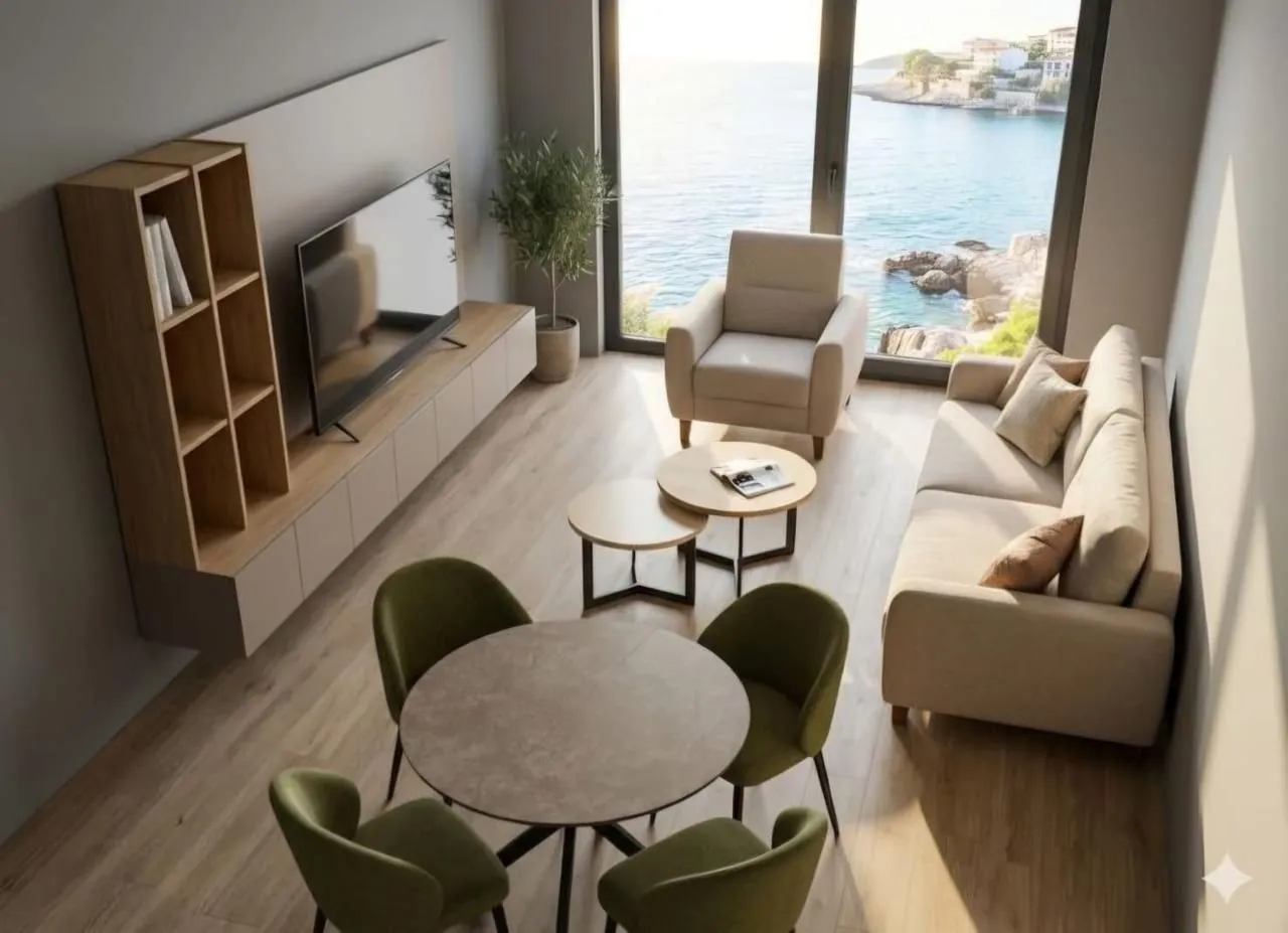 Living room with dining area and sea view.