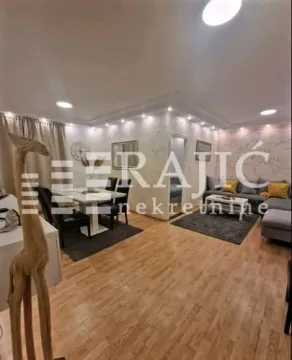 Spacious living room connected to the dining area. - image 2