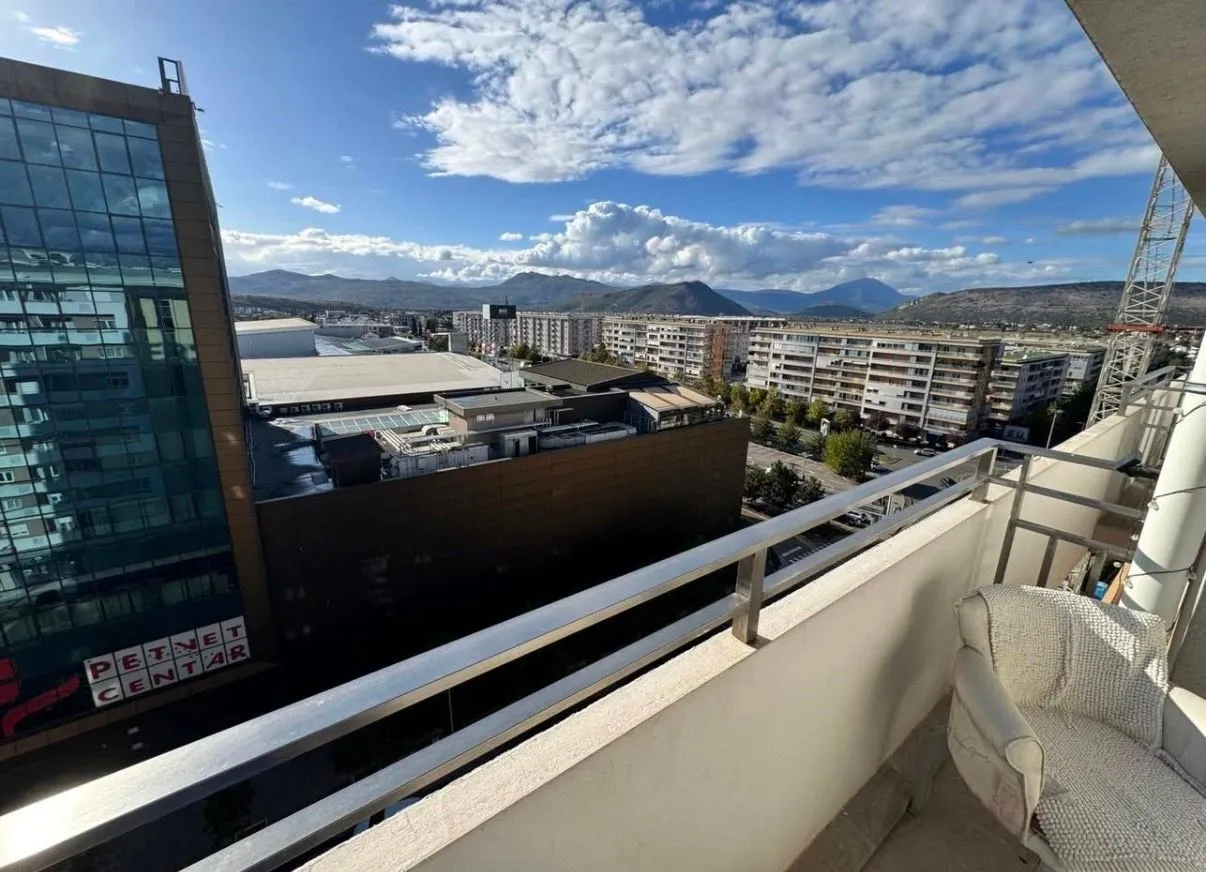 View of the city and surrounding mountains from the balcony.