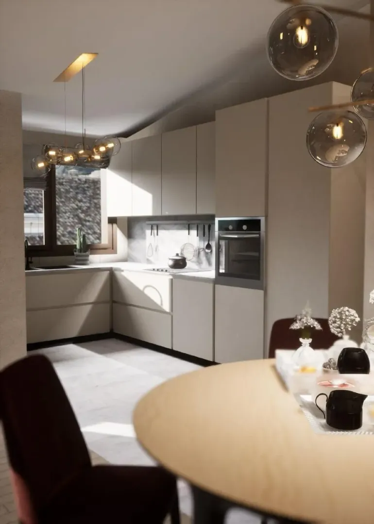 Modern kitchen with a dining table and built-in appliances.