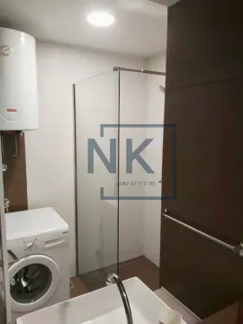 Bathroom equipped with a shower cabin, washbasin, washing machine and water heater. - image 4