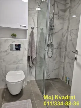Modern bathroom with a walk-in shower and built-in sanitaryware. - image 11