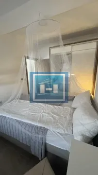 Bedroom with a double bed and a canopy. - image 11
