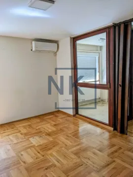 Empty room with hardwood flooring and access to the terrace. - image 6