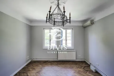 Empty room with parquet flooring, a chandelier, and an air conditioning unit. - image 15