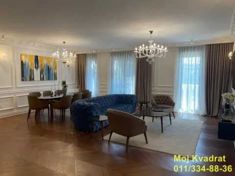 Spacious living room with sofa set and dining area. - image 4