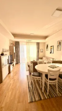 Living room with dining area and sofa set. - image 4