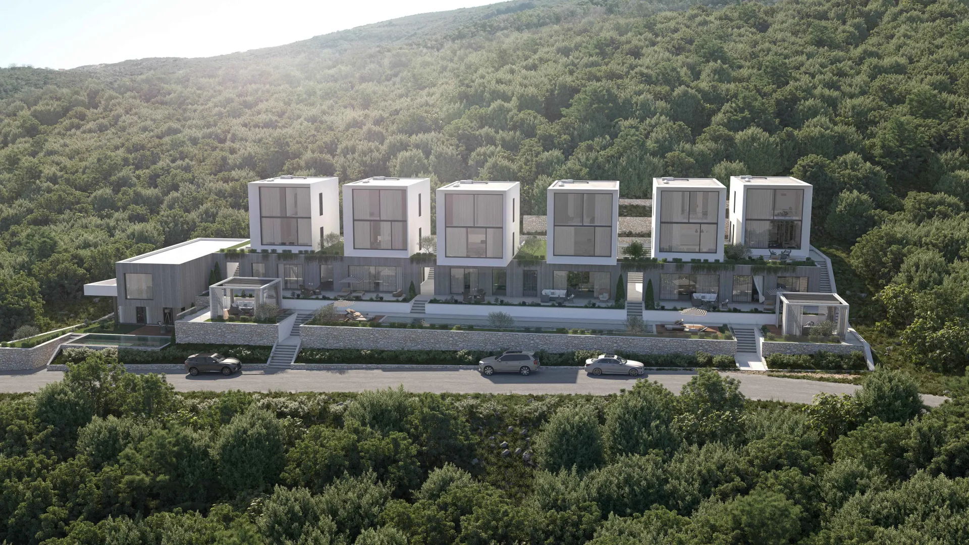 Pogled na spoljašnjost moderne stambene zgrade sa terasama i zelenilom.