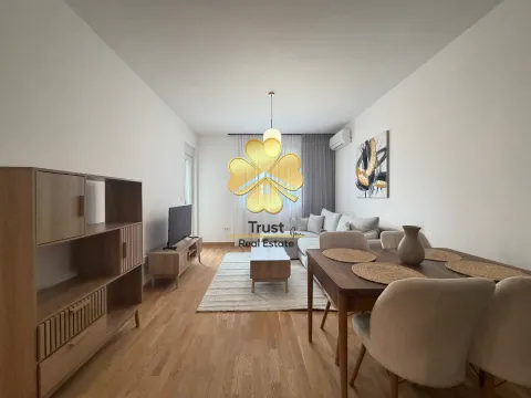 Living room with dining area and seating set. - image 2