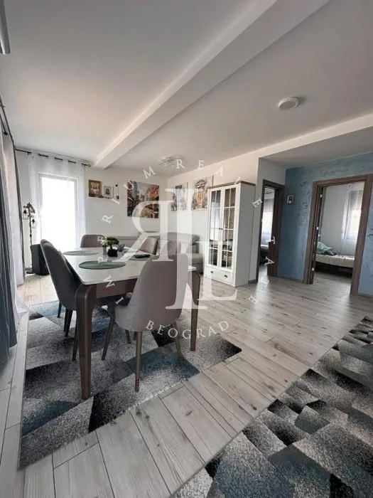 Living room with a dining table and chairs.