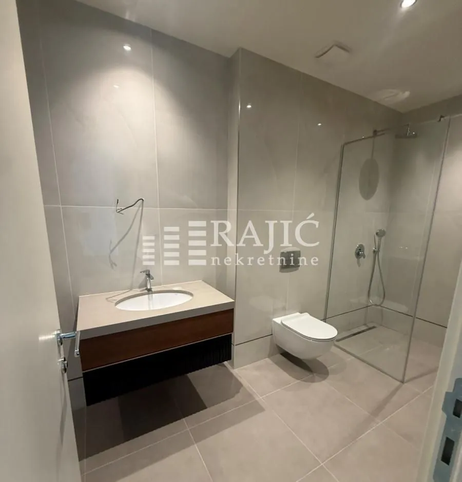 Modern bathroom with a walk-in shower.