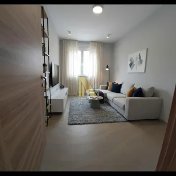 Dnevna soba sa ugaonom garniturom, TV komodom i tepihom. - image 19