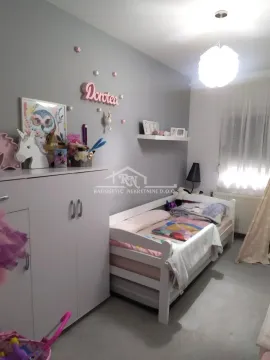 Children's bedroom with a bed, wardrobe, and wall decoration. - image 16
