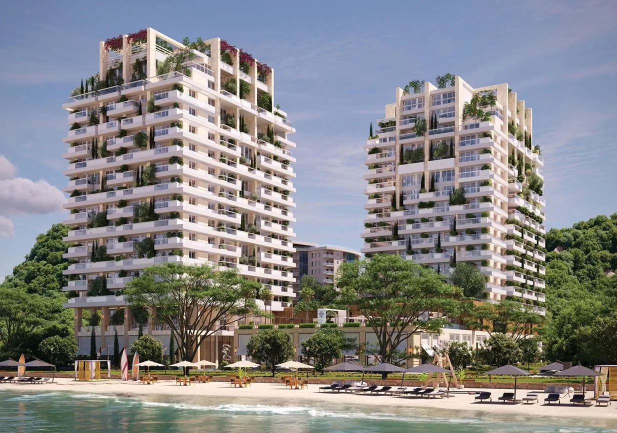 Pogled na spoljašnjost stambenog kompleksa sa plaže.