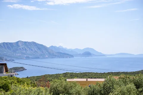 Distant view of the sea and mountains. - image 17