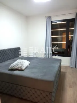 Bedroom with a double bed and a window. - image 11
