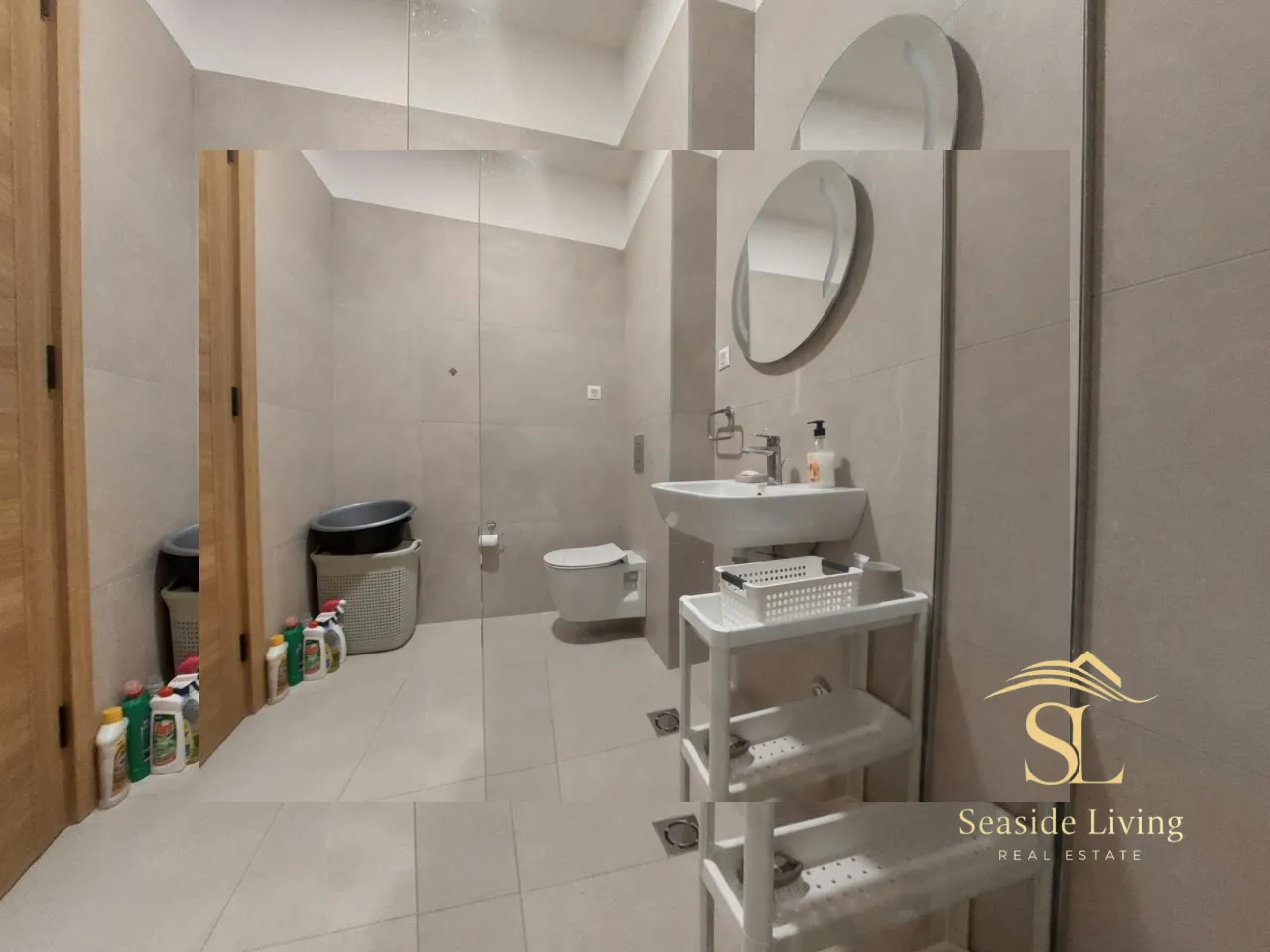Modernly equipped bathroom with a washbasin, toilet, and mirror.