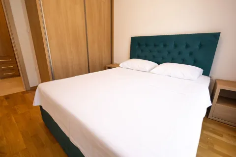 Furnished bedroom with a double bed and a fitted wardrobe. - image 15