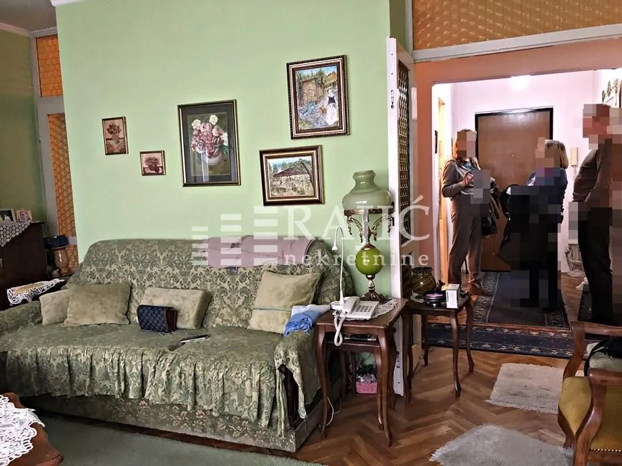 Living room with a sofa and furniture in the apartment.