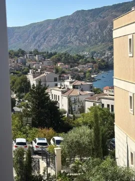 View from the terrace overlooking the settlement, sea, and mountains. - image 8