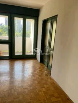 Empty room with wooden parquet flooring and access to the terrace. - image 5